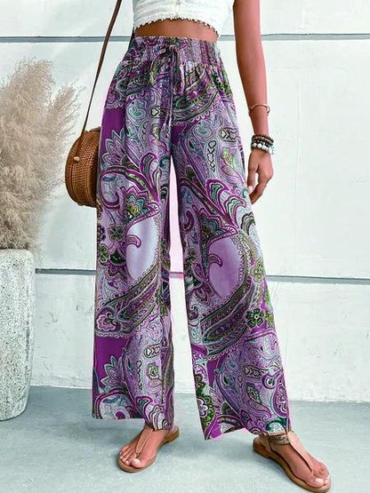 Women's wide-leg palazzo trousers with floral paisley pattern and elasticated waistband NOVAE