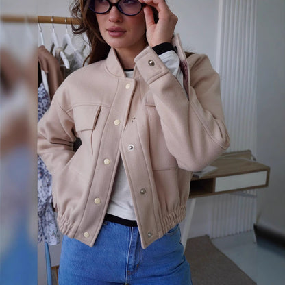 Women's fashionable short jacket with practical pockets and a cool collar NOVAE