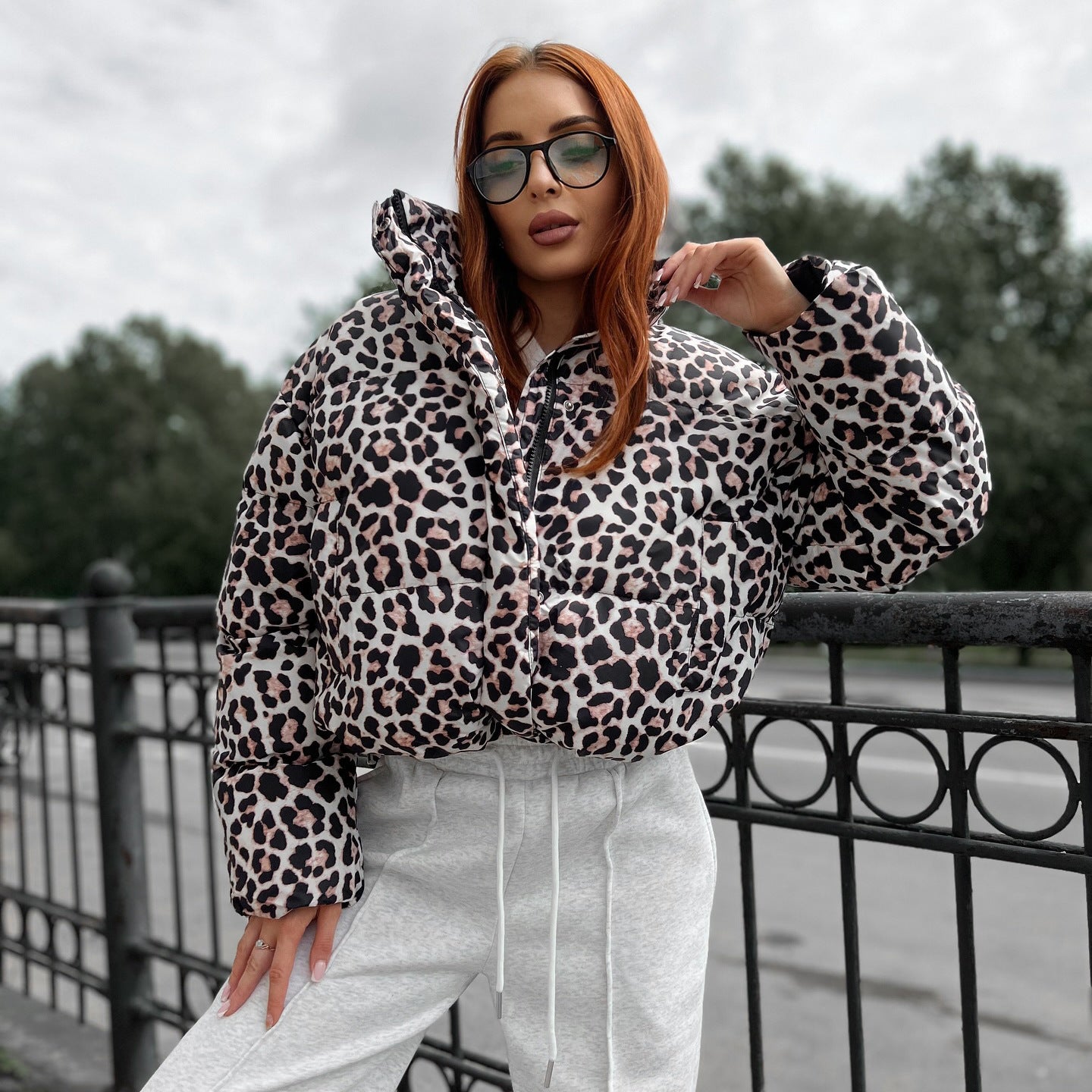 Women's stylish padded down jacket in fashionable leopard print NOVAE
