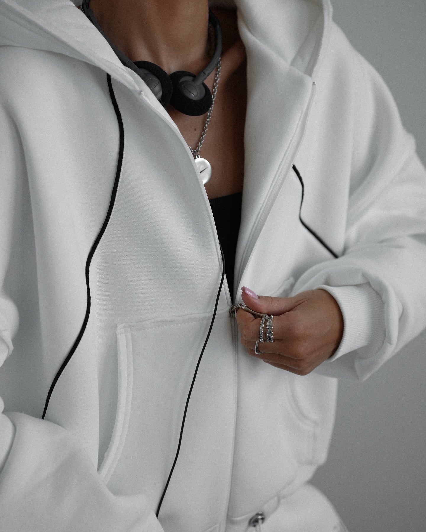 Women's hooded jacket with modern contrast stitching and kangaroo pocket NOVAE