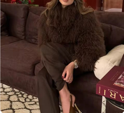 Women's fluffy faux fur jacket in a long cut with wide flared sleeves NOVAE