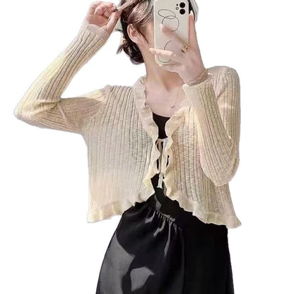 Women's cardigan with ruffle details and airy structure NOVAE