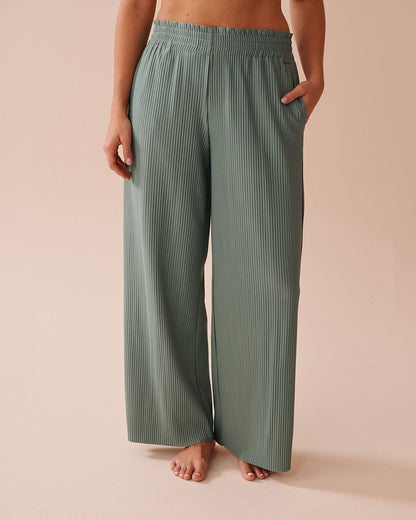 Women's wide-leg pleated trousers with elasticated waistband and side pockets NOVAE