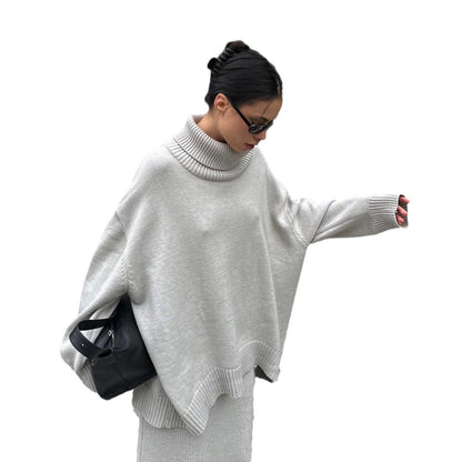 Women's comfortable knit suit with high collar and flared trousers NOVAE