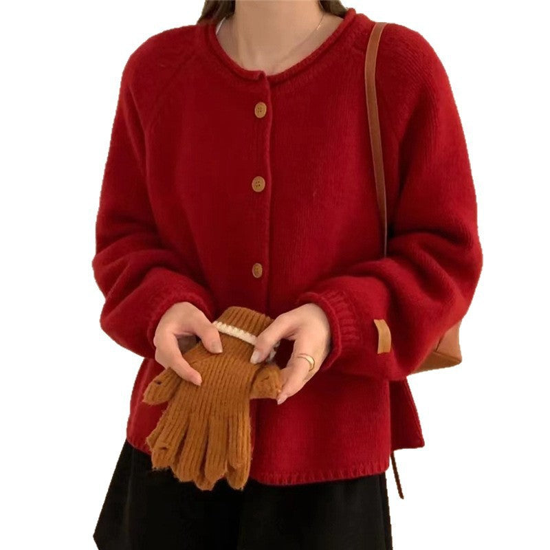 Women's cardigan with asymmetrical cut and generous balloon sleeves NOVAE