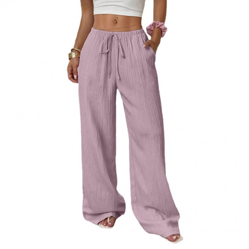 Women's casual and wide-legged leisure trousers with elasticated waistband and tie belt NOVAE