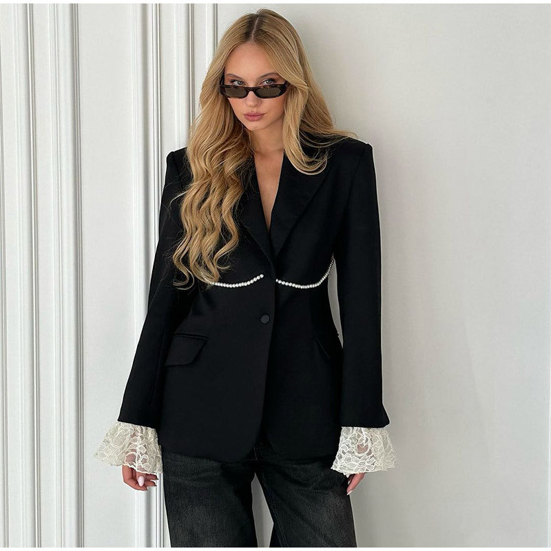 Women's elegant blazer jacket with a relaxed fit and striking sleeves NOVAE