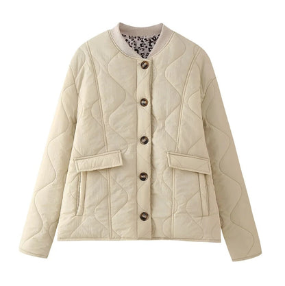 Women's quilted transitional jacket with practical pockets and round neckline NOVAE