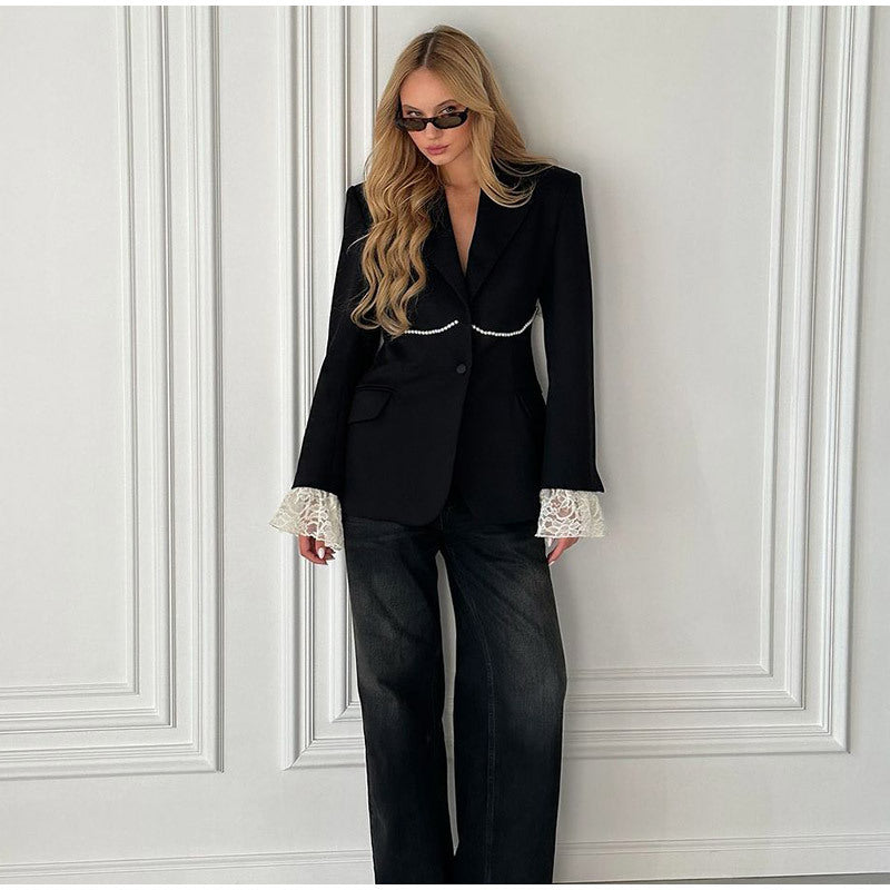 Women's elegant blazer jacket with a relaxed fit and striking sleeves NOVAE