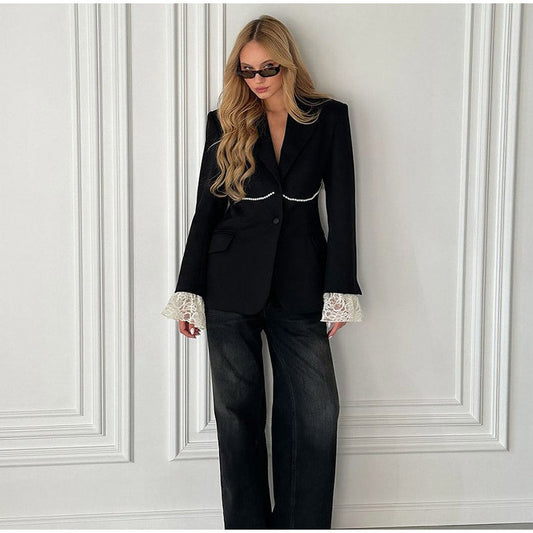 Women's elegant blazer jacket with a relaxed fit and striking sleeves NOVAE