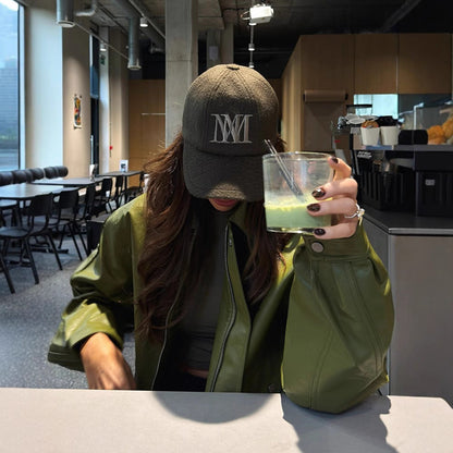 Women's faux leather jacket in a casual cropped style with practical pockets NOVAE