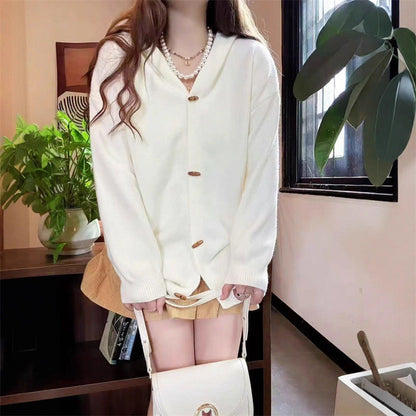 Women's stylish cardigan with hood and decorative buttons NOVAE