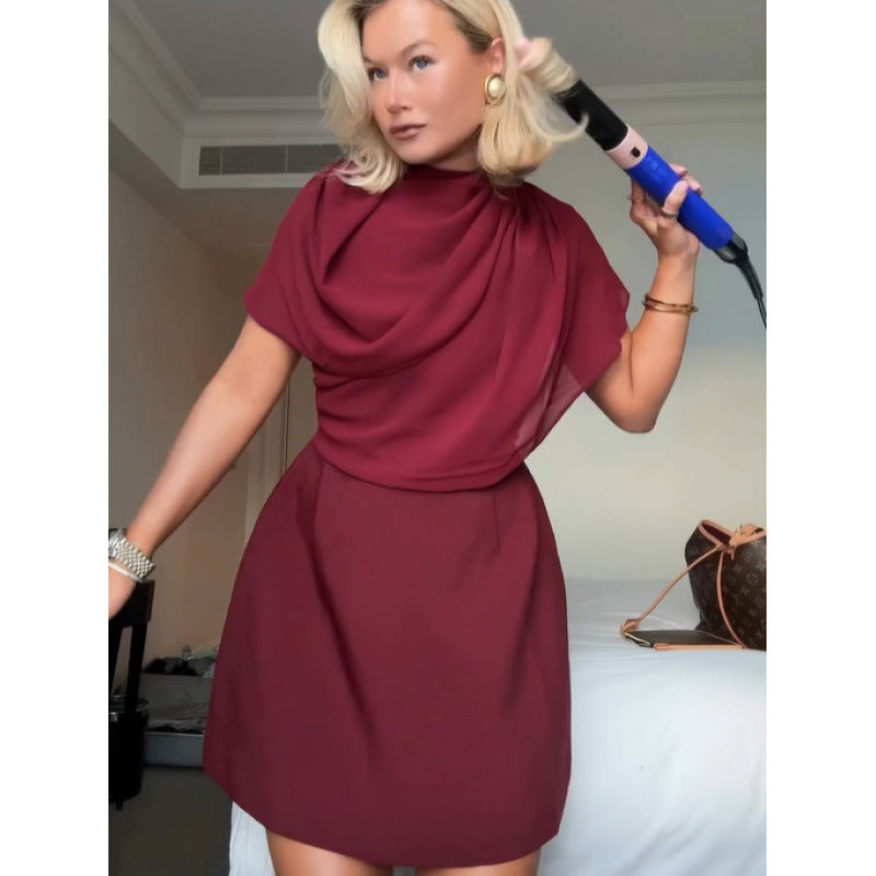 Women's dress with elegant halter neck design and flowing fabric NOVAE