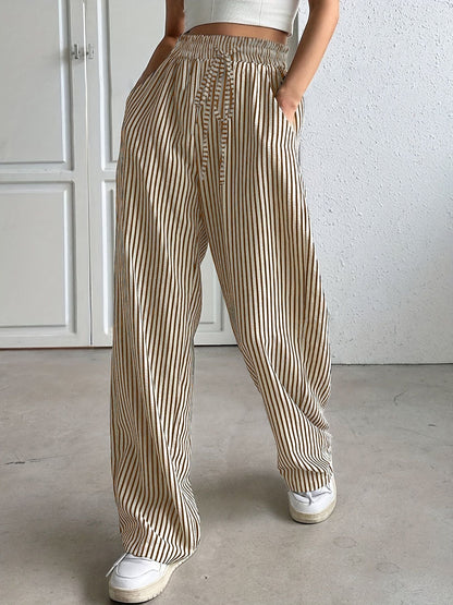 Women's wide-legged striped trousers with elasticated waistband and practical pockets NOVAE
