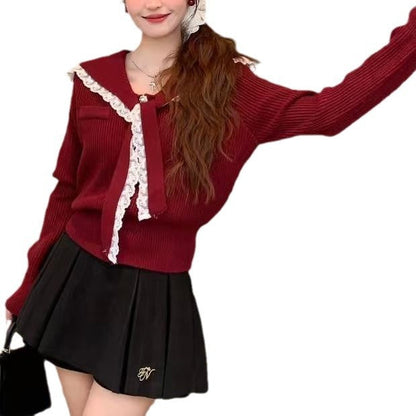 Women's cardigan with ruffled neckband and decorative buttons NOVAE