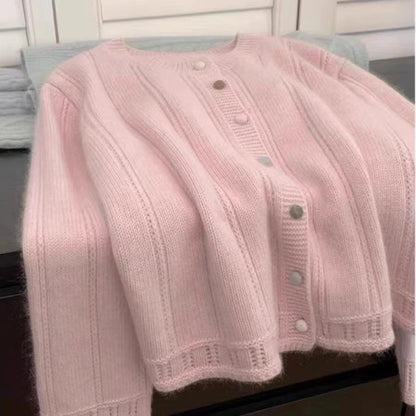 Women's cardigan with decorative rib design and button closure NOVAE