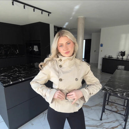 Women's fashionable trench coat with high collar and practical side pockets NOVAE