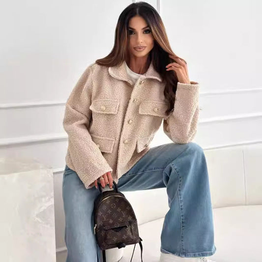 Women's teddy jacket with practical pockets and elegant button details NOVAE