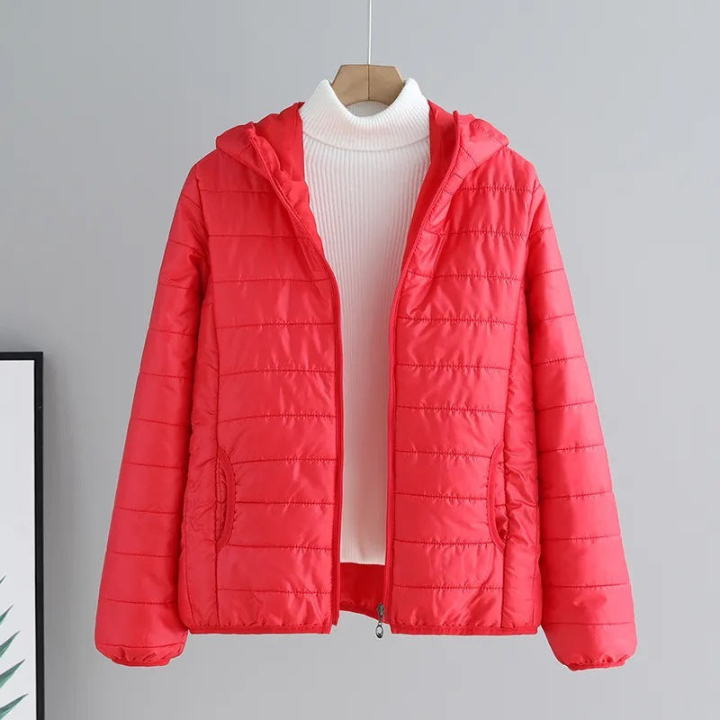 Women's quilted transitional jacket with practical pockets and hood NOVAE