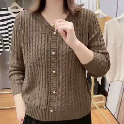 Women's cardigan with a fine cable knit pattern and elegant pearl buttons NOVAE