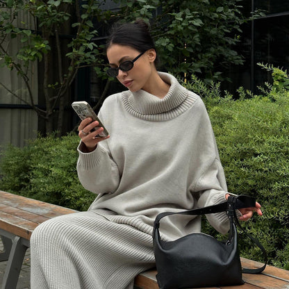 Women's comfortable knit suit with high collar and flared trousers NOVAE