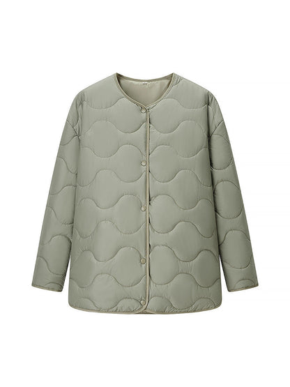 Women's quilted transitional jacket with soft fabric texture and practical snap fasteners NOVAE