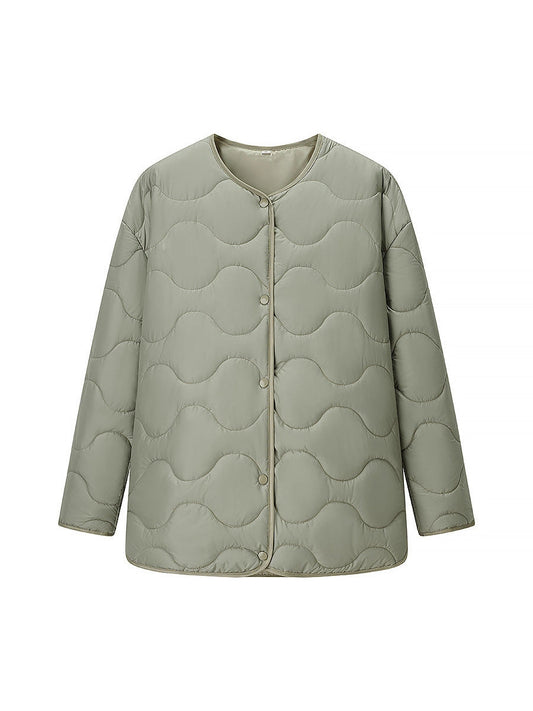 Women's quilted transitional jacket with soft fabric texture and practical snap fasteners NOVAE