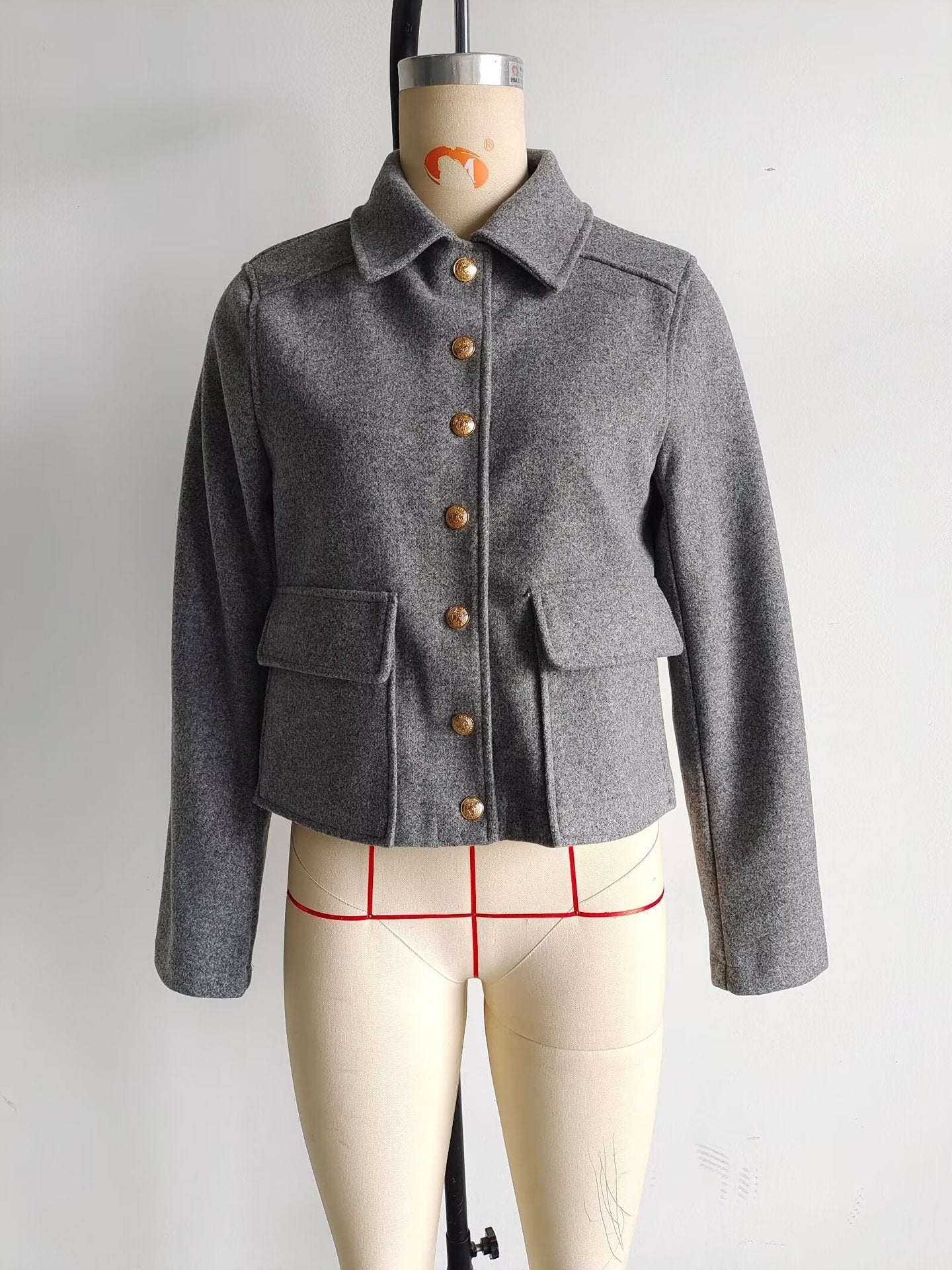 Women's fashionable short jacket with practical pockets and gold buttons NOVAE