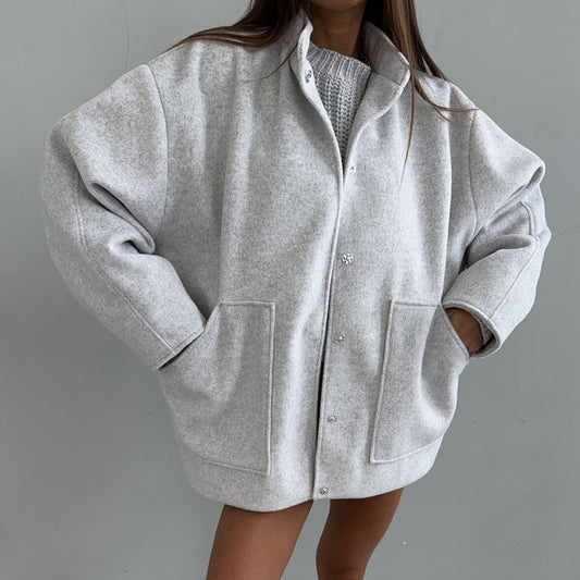 Women's oversized wool jacket with simple button details and practical pockets NOVAE
