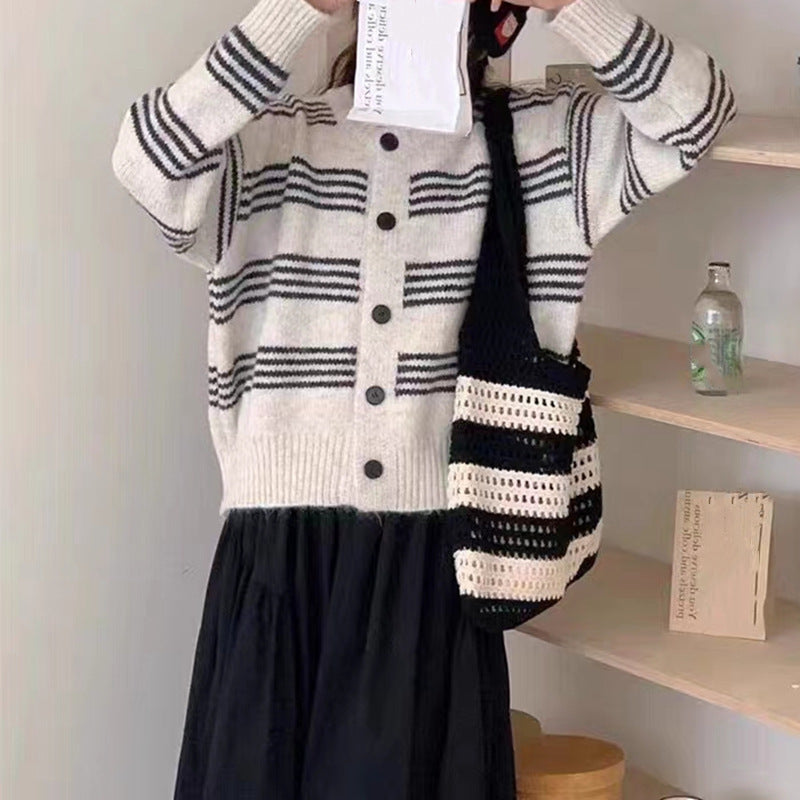 Women's fashionable cardigan with fine striped texture and decorative buttons NOVAE