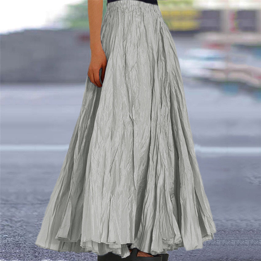 Women's long, flowing skirt with elastic waistband and modern texture NOVAE