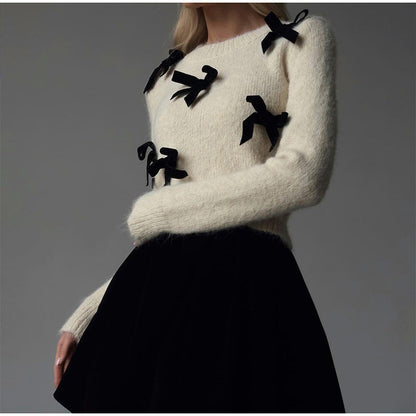 Women's knitted sweater with decorative bows NOVAE