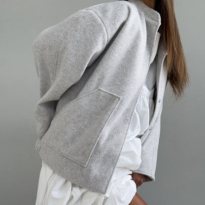 Women's oversized wool jacket with simple button details and practical pockets NOVAE