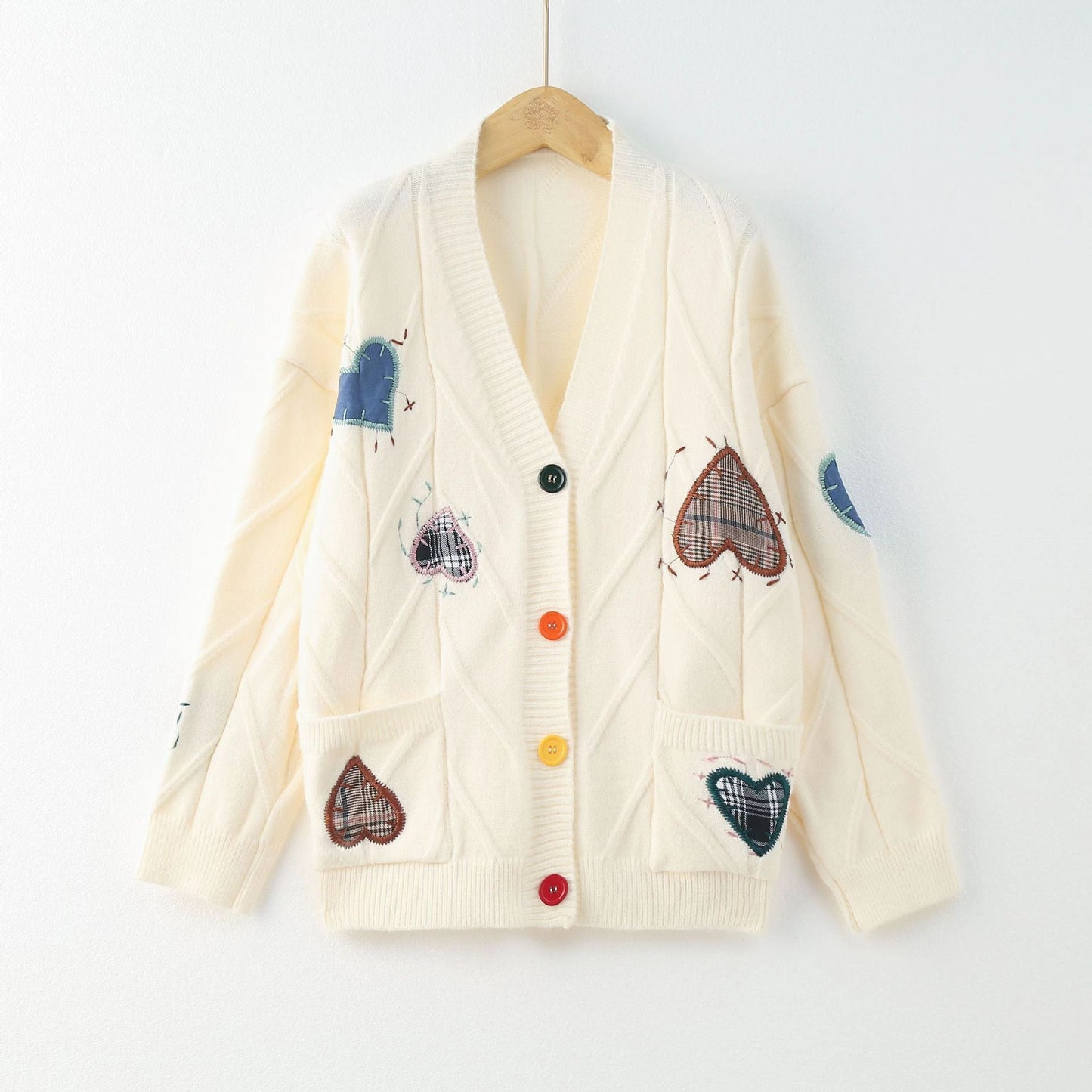 Women's cardigan with heart appliqués and button detailing NOVAE
