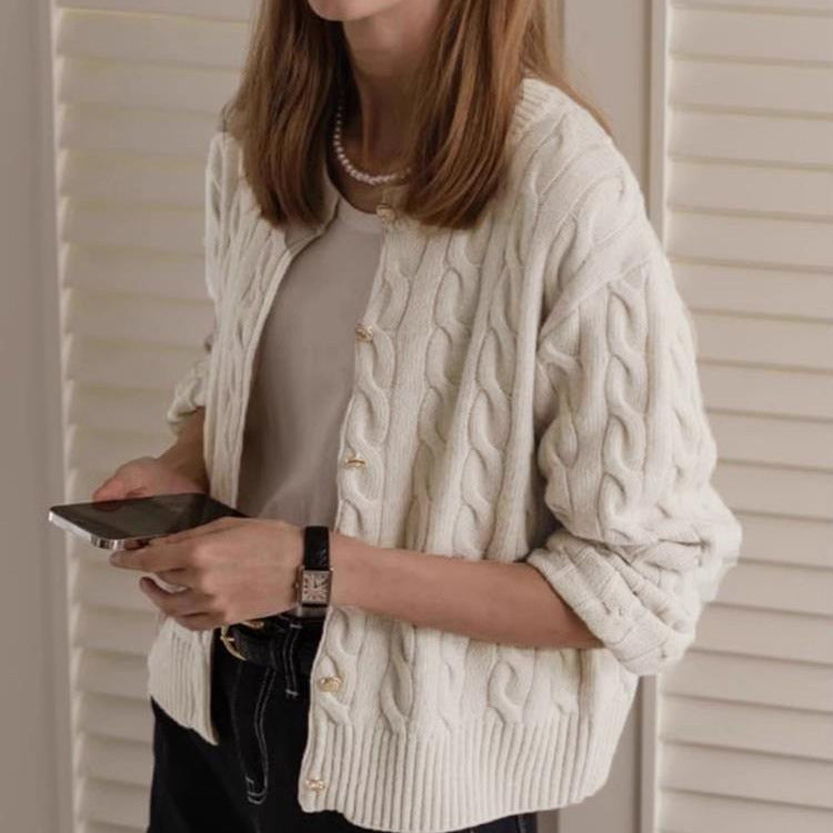 Women's cardigan with cable knit pattern and elegant button details NOVAE