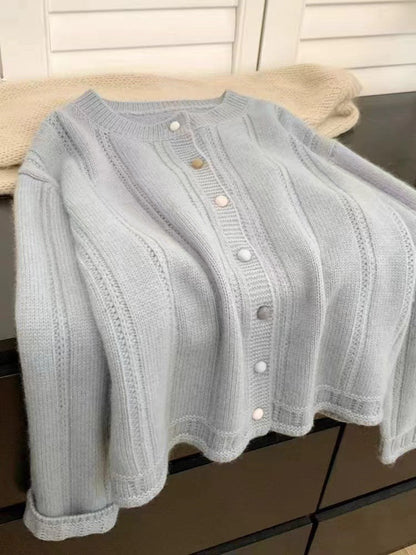 Women's cardigan with decorative rib design and button closure NOVAE