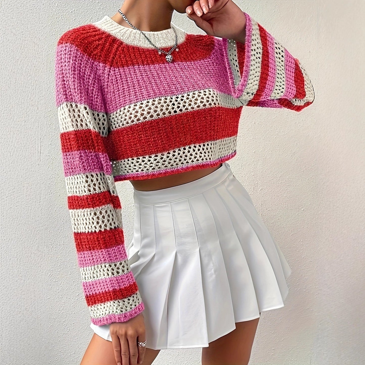 Women's knitted sweater with playful openwork pattern and colorful stripes NOVAE