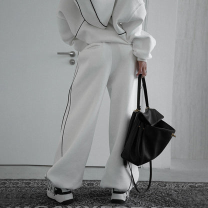 Women's hooded jacket with modern contrast stitching and kangaroo pocket NOVAE