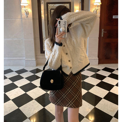 Women's chunky knit cardigan with unique cable pattern and elegant buttons NOVAE