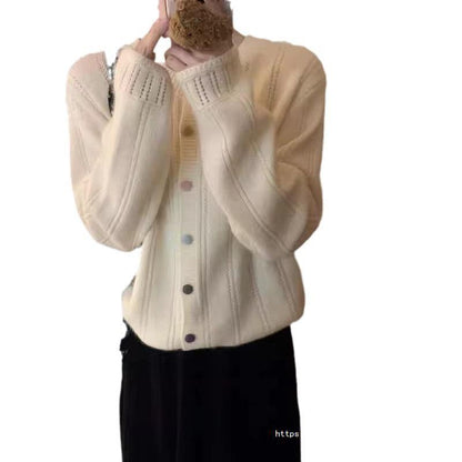 Women's cardigan with decorative rib design and button closure NOVAE