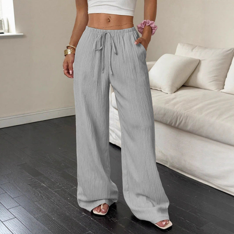 Women's casual and wide-legged leisure trousers with elasticated waistband and tie belt NOVAE