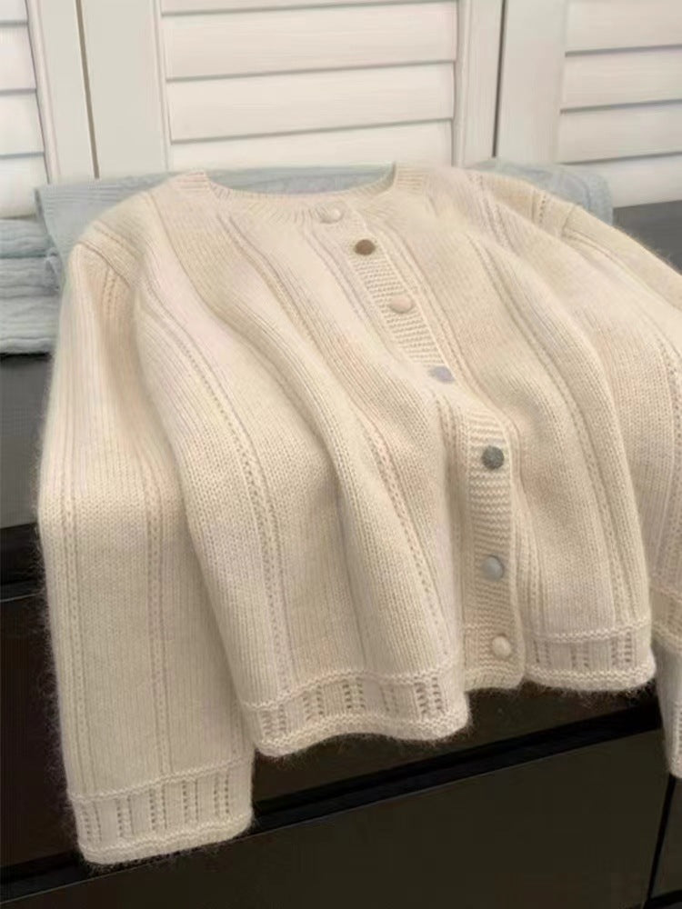 Women's cardigan with decorative rib design and button closure NOVAE