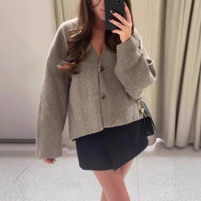 Women's modern oversized jacket with elegant button closure NOVAE