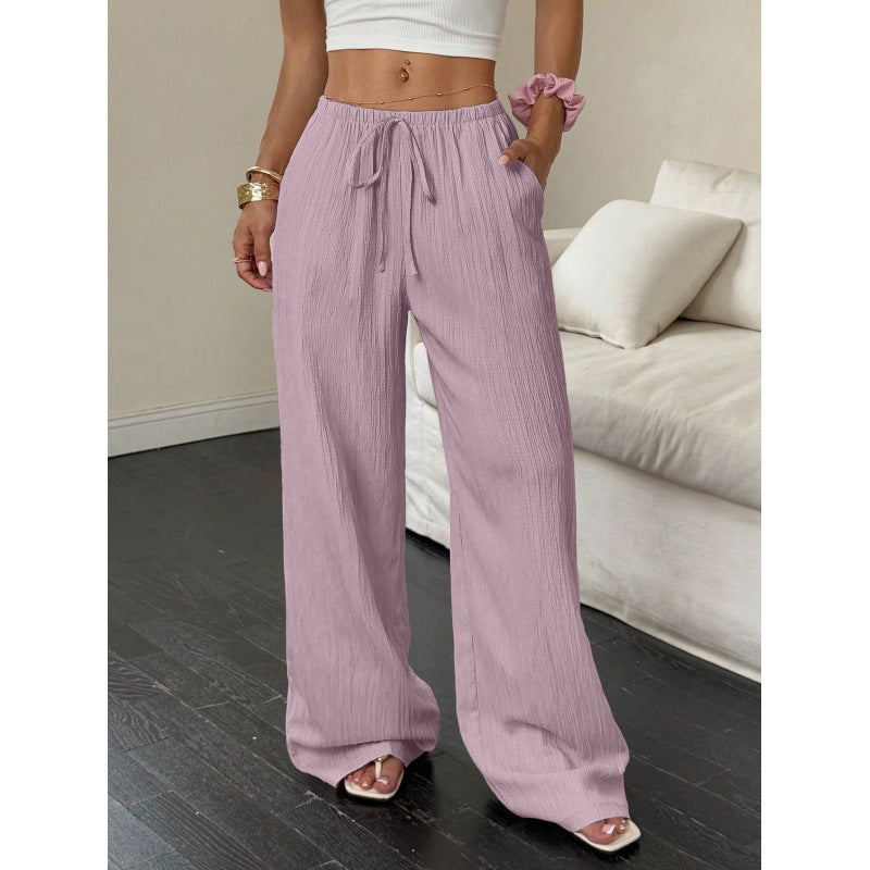 Women's casual and wide-legged leisure trousers with elasticated waistband and tie belt NOVAE