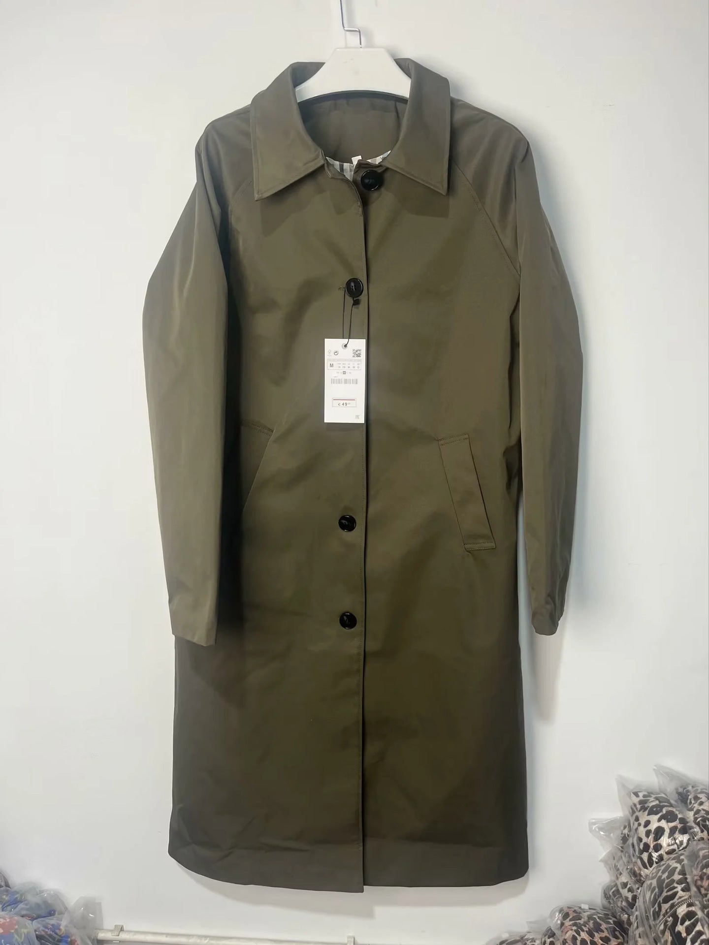 Women's fashionable transitional jacket with elegant stand-up collar and practical button details NOVAE