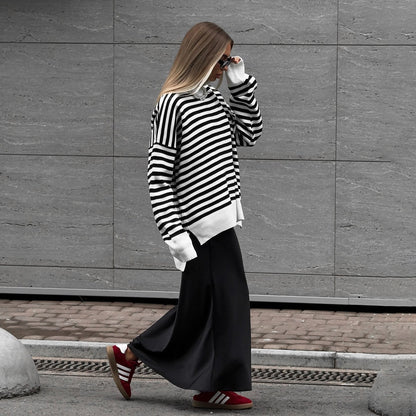 Women's striped sweater in a casual oversized style with wide sleeves NOVAE
