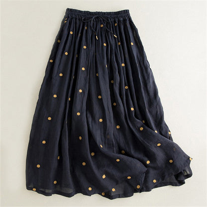 Women's long, airy skirt with elastic waistband and polka dot design NOVAE