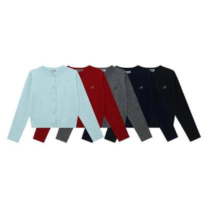 Women's cardigan with fine rib pattern and contrasting button details NOVAE