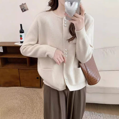 Women's cardigan with elegant pearl buttons NOVAE