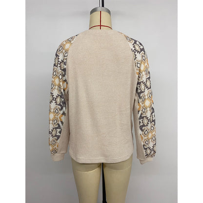 Women's knit sweater with modern raglan sleeves and floral pattern NOVAE